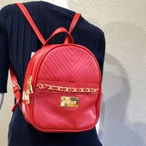 BEBE Red backpack top handle bag New